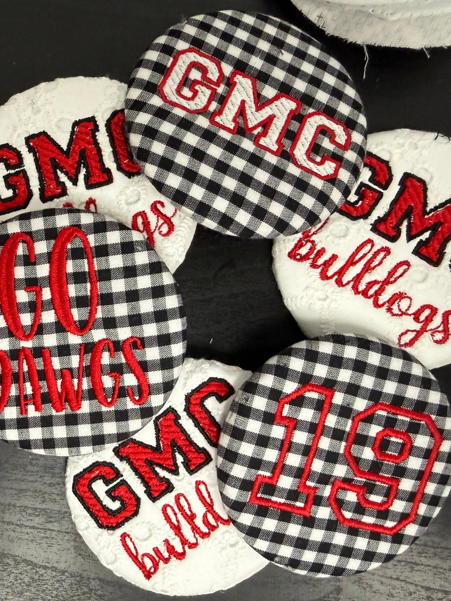 Embroidered GMC buttons