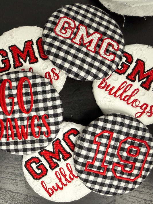 Embroidered GMC buttons